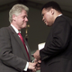 Then-President Bill Clinton presents boxing legend Muhammad Ali with the Presidential Citizens Medal on Jan. 8, 2001, at the White House in Washington, D.C.
STEVE JAFFE/AFP/Getty Images